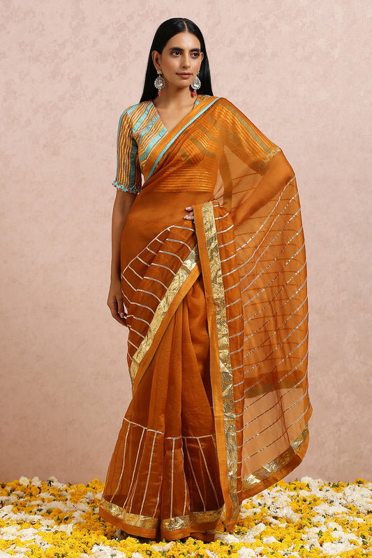 Rust Saree With Sleeves Blouse